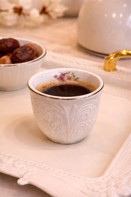 طقم 12 فنجان قهوة ابيض مزخرف